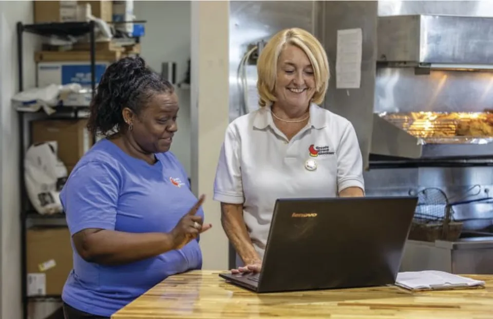 Julie Montague the Chief Operating Officer of Creole Fried Chicken LLC - by Steven J. Austin